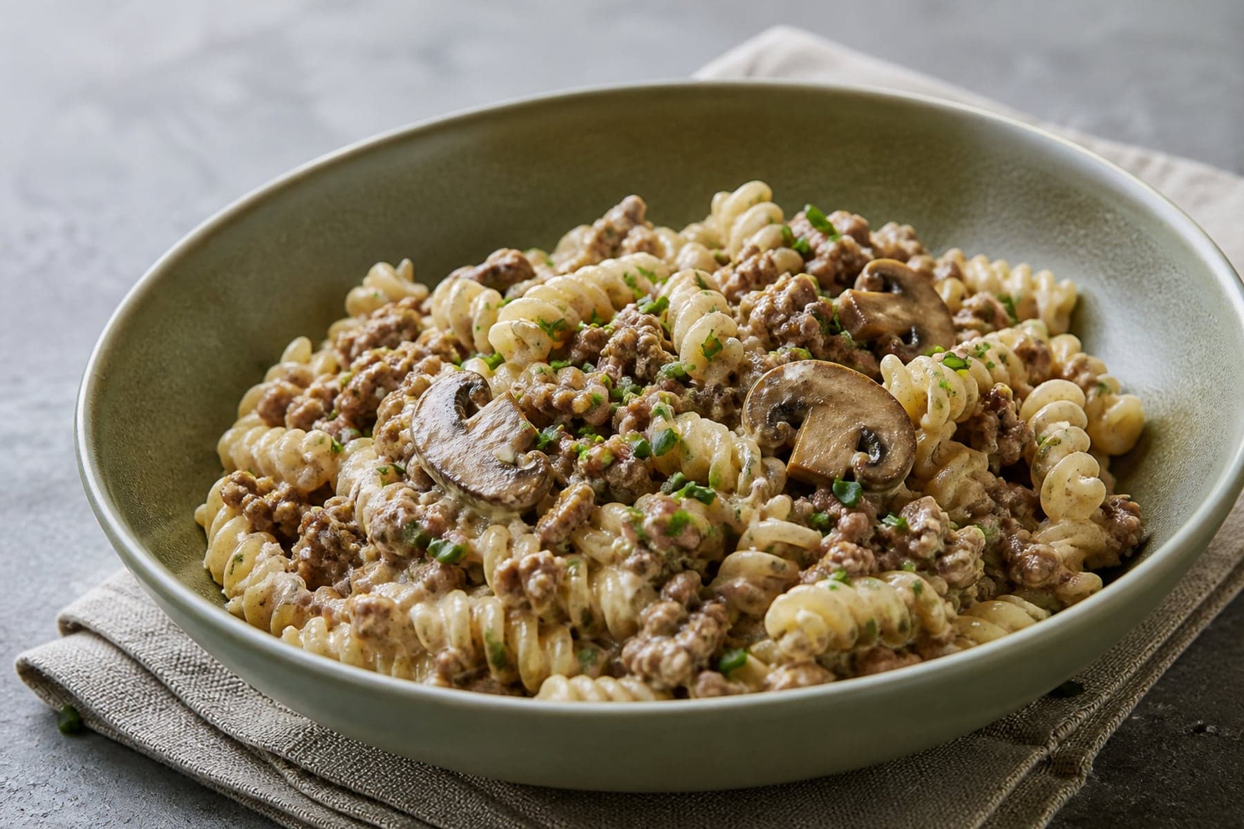 Fusilli with browned beef mince mushrooms and a pale mustard cream sauce