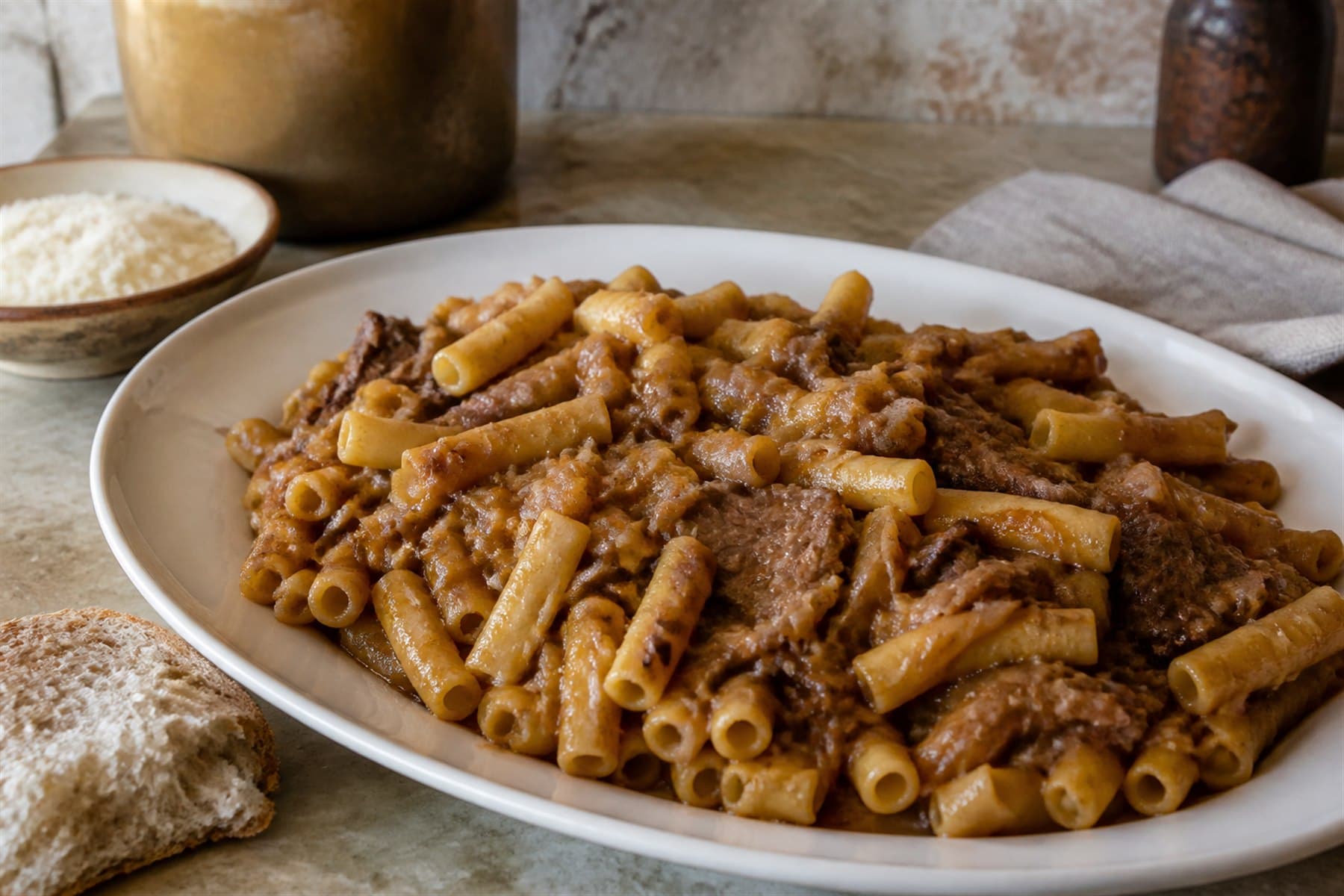 Bronze onion and beef Genovese sauce folded through ziti